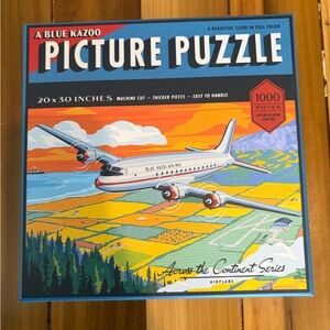 Picture Puzzle 1000pc - Blue, Orange & Yellow Airplane Scene